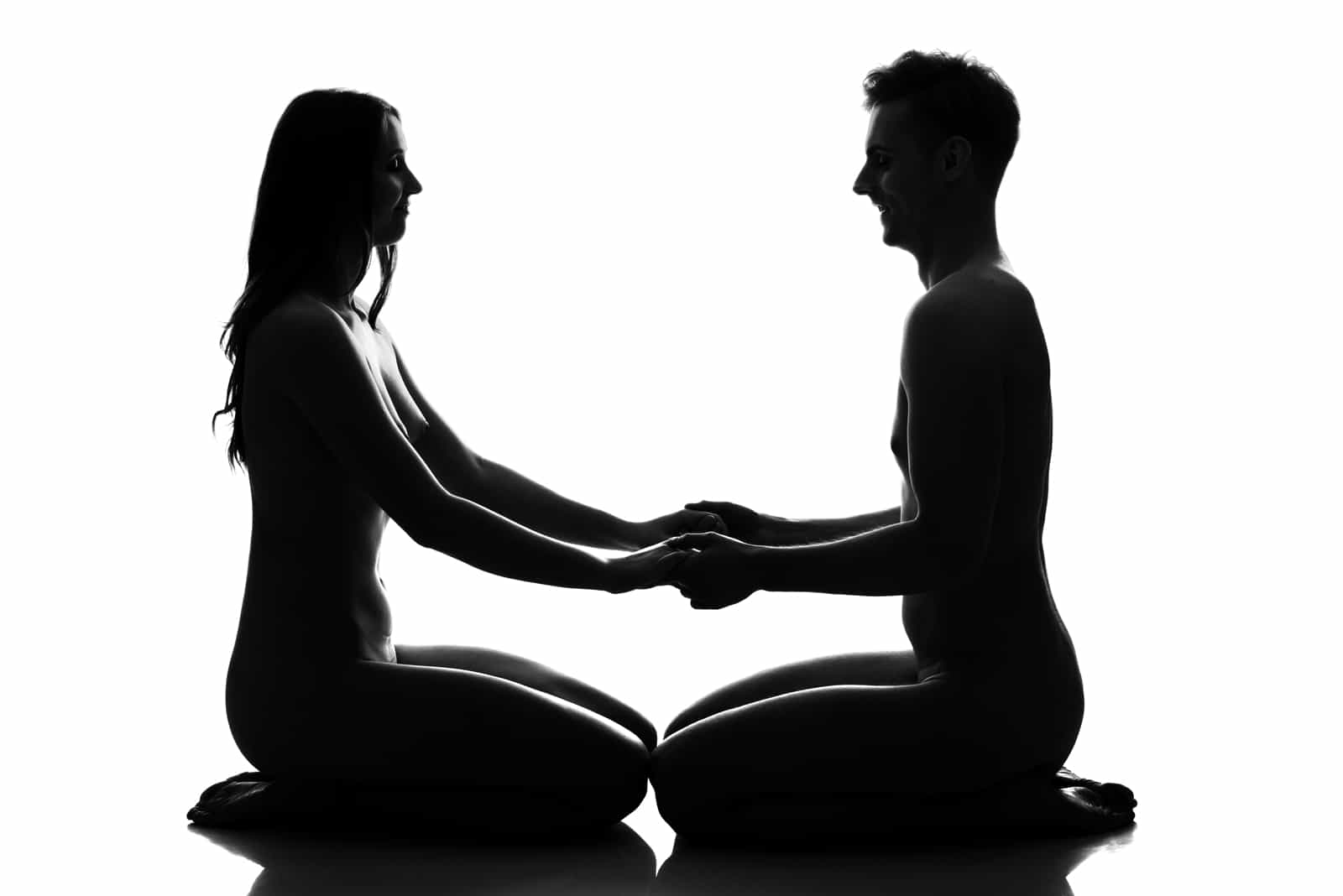 Young adult nude couple. High contrast black and white